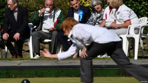 Reuters Theresa May and her husband Philip visits a bowls club during the election campaign