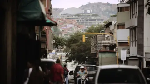 The dome of El Helicoide seen from the ground in central Caracas