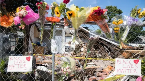 Getty Images A memorial at the site of a June attack in Massachusetts that is being treated as a hate crime.