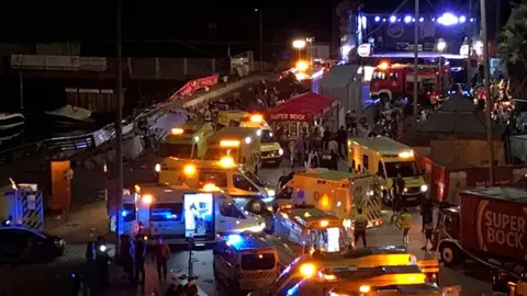 EPA Several ambulances at the scene of the collapse in Vigo overnight on 12/13 August 2018