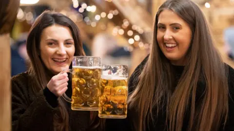 Getty Images Women having a drink in Cardiff