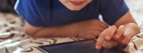 Getty Images Boy on a tablet computer