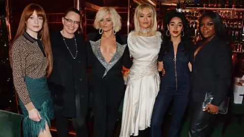 Getty Images Nicola Roberts, Sarah Stennett, Bebe Rexha, Rita Ora, Kara Marni and RAY BLK at the Women In Harmony dinner in London in September