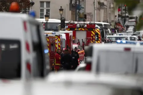 EPA French police and security forces establish a security perimeter near the police headquarters in Paris.