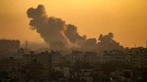 Smoke rises after Israeli air strikes in Gaza