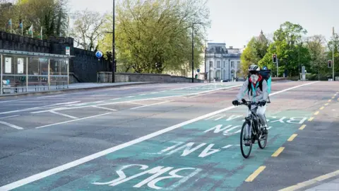 Getty Images Lone cyclist in Cardiff