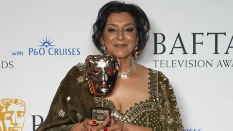 PA Media Meera Syal with the Bafta Fellowship award at the Bafta Television Awards 2023 at the Royal Festival Hall, London