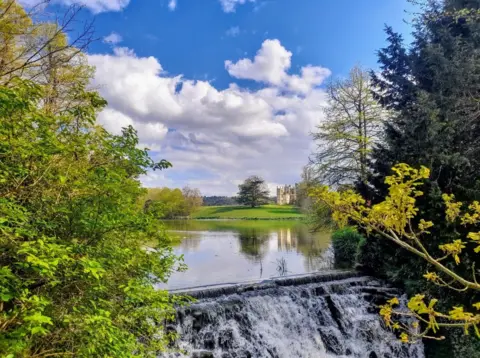 Soberty This shot of a waterfall with a glorious view behind it was taken by Weather Watcher Soberty in Sherborne