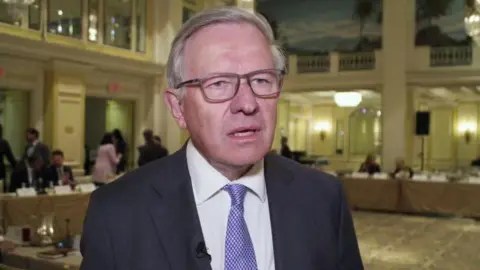 HSBC Sir Sherard Cowper-Coles.