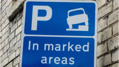 Alamy A car parking sign