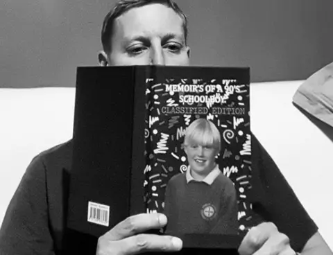 Michael Sleggs/Instagram Michael Sleggs reading mock up of his book