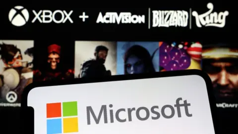 Getty Images Microsoft logo and Activision Blizzard logo