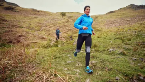 Steve Ashworth Sabrina Verjee descending to Easdale from Helm Crag