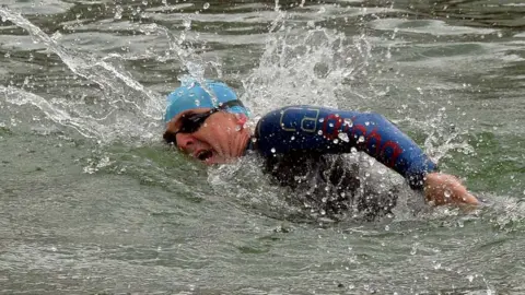 TSB Paul Pester swimming during a triathlon