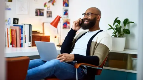 Getty Images Man working from home