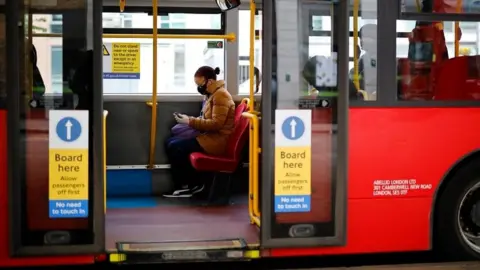 AFP Woman on London bus