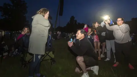 Danny Lawson/PA Media Rhys Whelan proposes to Megan Greenwood