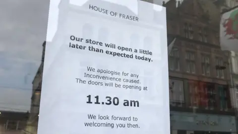 A sign on the door of the Cardiff store on Thursday