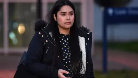Getty Images Sneha Chowdhury leaves after appearing at the first day of her trial at Woolwich Crown Court in south east London on January 6, 2020. - Sneha Chowdhury, along with her brother Mohiussunnath Chowdhury, are accused of plotting a mass casualty terror attack. Sneha Chowdhury faces two charges of failing to disclose information relating to an alleged plot to carry out a mass casualty act of terrorism. The trial is set to last between three and four weeks.