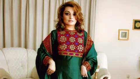 Dr Bahar Jalali Tweeted photo of Dr Bahar Jalali in her traditional Afghan dress