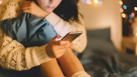 Getty Images Girl on phone