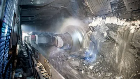 EPA A coal-cutting machine in a tunnel at a coal mine operated by Beijing Haohua Energy Resource co.