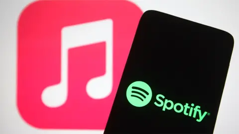 Getty Images Spotify and Apple Music logos