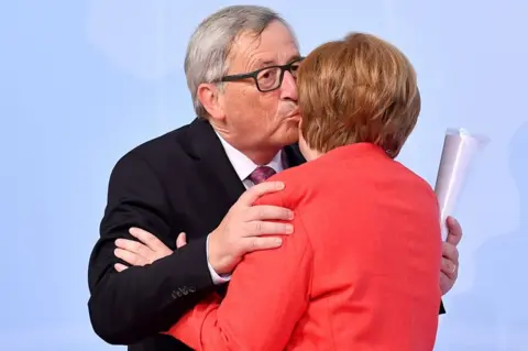 EPA German Chancellor Angela Merkel (R) and President of the European Commission Jean-Claude Juncker at the official reception to the opening day of the G20 summit in Hamburg, 7 July