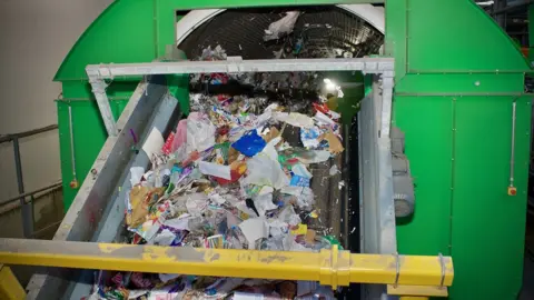 Martin Giles/BBC Recycling tumbler machine in operation