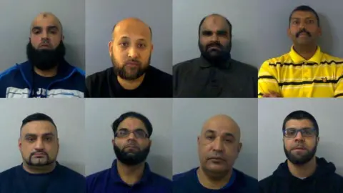 Thames Valley Police (Top L-R) Assad Hussain, Moinul Islam, Haji Khan, Raheem Ahmed (Bottom L-R) Kamran Khan, Kameer Iqbal, Alladitta Yousaf, Khalid Hussain