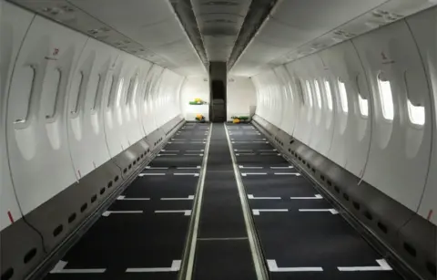 Reuters An inside view of an empty aeroplane stripped of its seats.