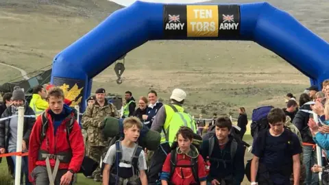 @Tentors Torbay Scouts crossing the Ten Tors finishing line, 13 May 2018