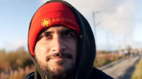 BBC Hikmatan in a makeshift migrant camp in Northern France