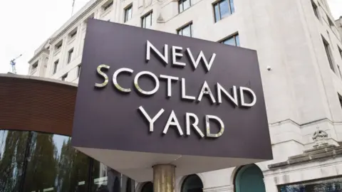 Getty Images An image of the New Scotland Yard sign outside the Met Police headquarters in London