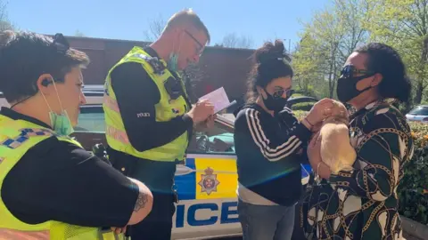 Wiltshire Police Lisa Lockey with Paris and police officers
