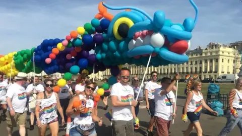 A dragon is paraded through the streets