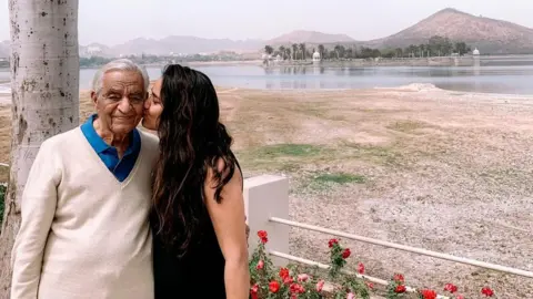 Avani Singh Avani Singh with her grandfather, 94, who is ill with Covid-19 in Delhi