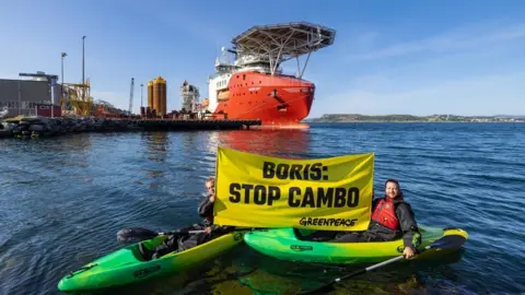 Espen Mills/Greenpeace Greenpeace protesters at Siem Day vessel in Stavanger