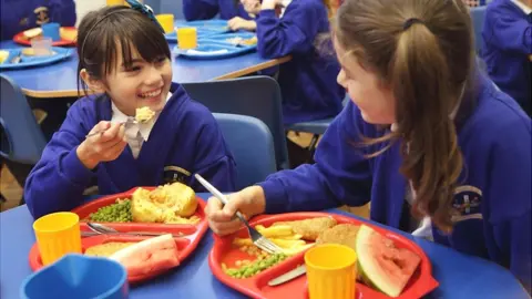 Getty Images Pupils eating school meals