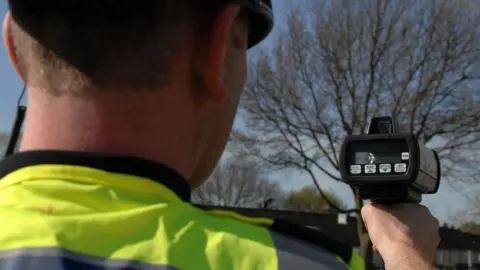 Rutland County Council Person holding a speed camera