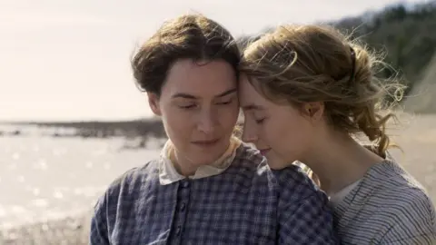 See Saw Films / Lionsgate Films Kate Winslet (left) and Saoirse Ronan play Mary Anning and geologist Charlotte Murchison