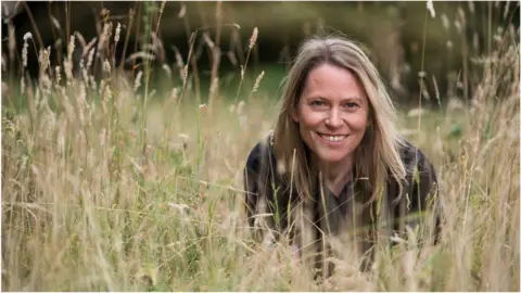 John Cairns Amy Dickman in long grass