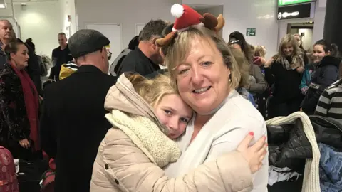 Sue Platts Host families waited at Gatwick airport on Friday to welcome the slightly delayed group of children