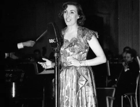 PA Media Vera Lynn on stage at the Grosvenor House during the National Radio Awards 1949