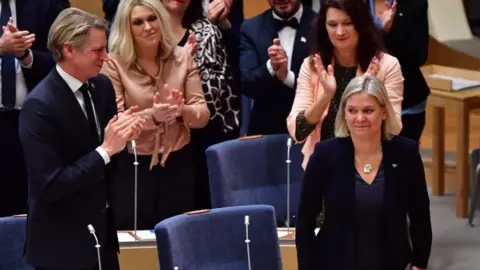 Reuters Magdalena Andersson is applauded by MPs