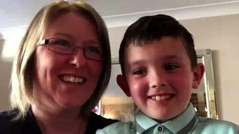 An eight-year-old boy has been praised for his presence of mind after he made an 999 call to emergency services.