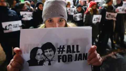 Getty Images A candle-lit vigil for Jan Kuciak and Martina Kusnirova in Krakow on 2 March 2018