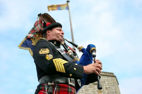 PA Media The Queen's Piper, Pipe Major Richard Grisdale