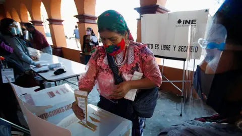 Reuters An indigenous Zapotec woman casts her vote at a polling station during the mid-term elections in the rural village of San Bartolome Quialana