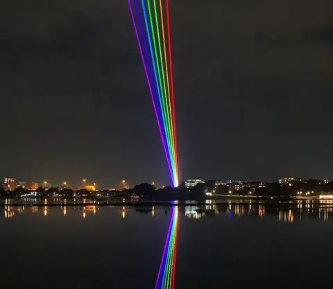 Poole laser rainbow beamed into night sky